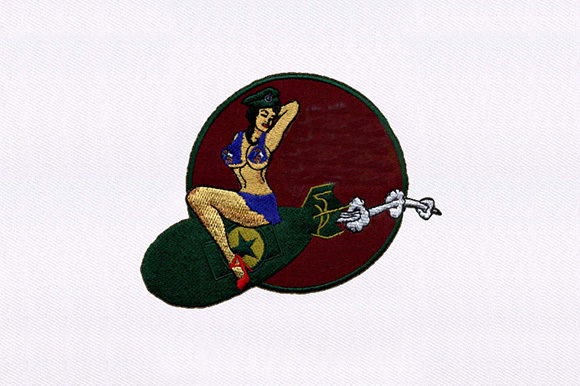 Bomb Perched Woman Embroidery Design Review